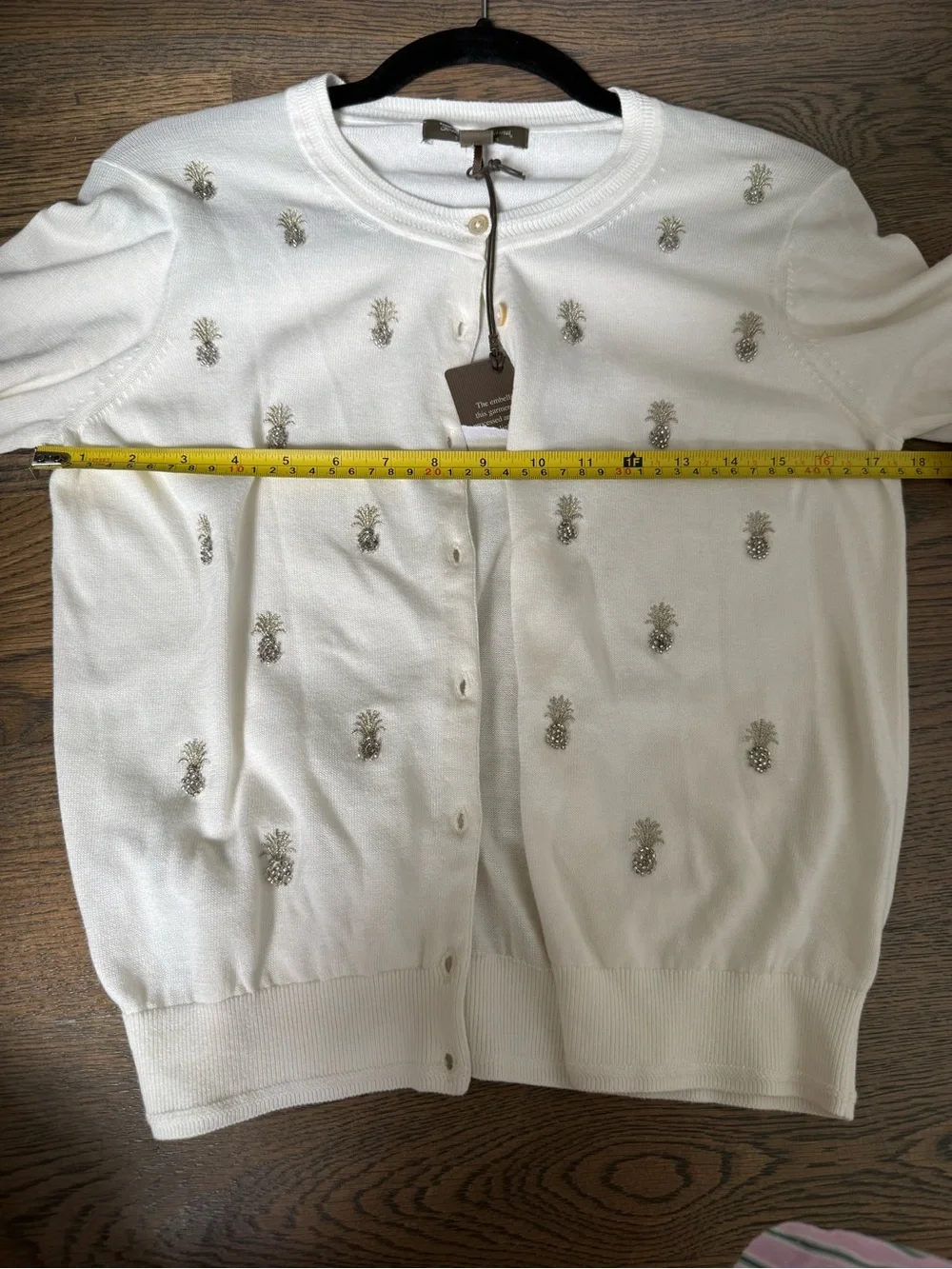 Tommy Bahama Cream Button-Front Pima Cotton Top with pineapple embellishments.